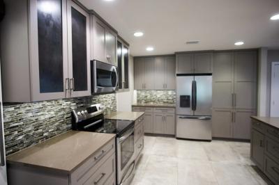 Wide kitchen view with full cabinet wall