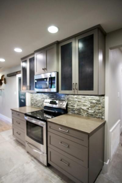 Cabinetry detail with glass-front uppers