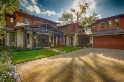 Front entry — heavy-timber porch and glass entry doors