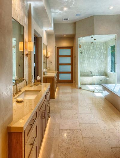 Master bath with double vanity and frameless glass shower