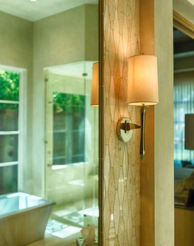 Master bath detail — onyx accent tile and polished nickel sconces