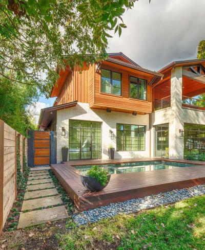 Side courtyard with mahogany deck and dipping pool